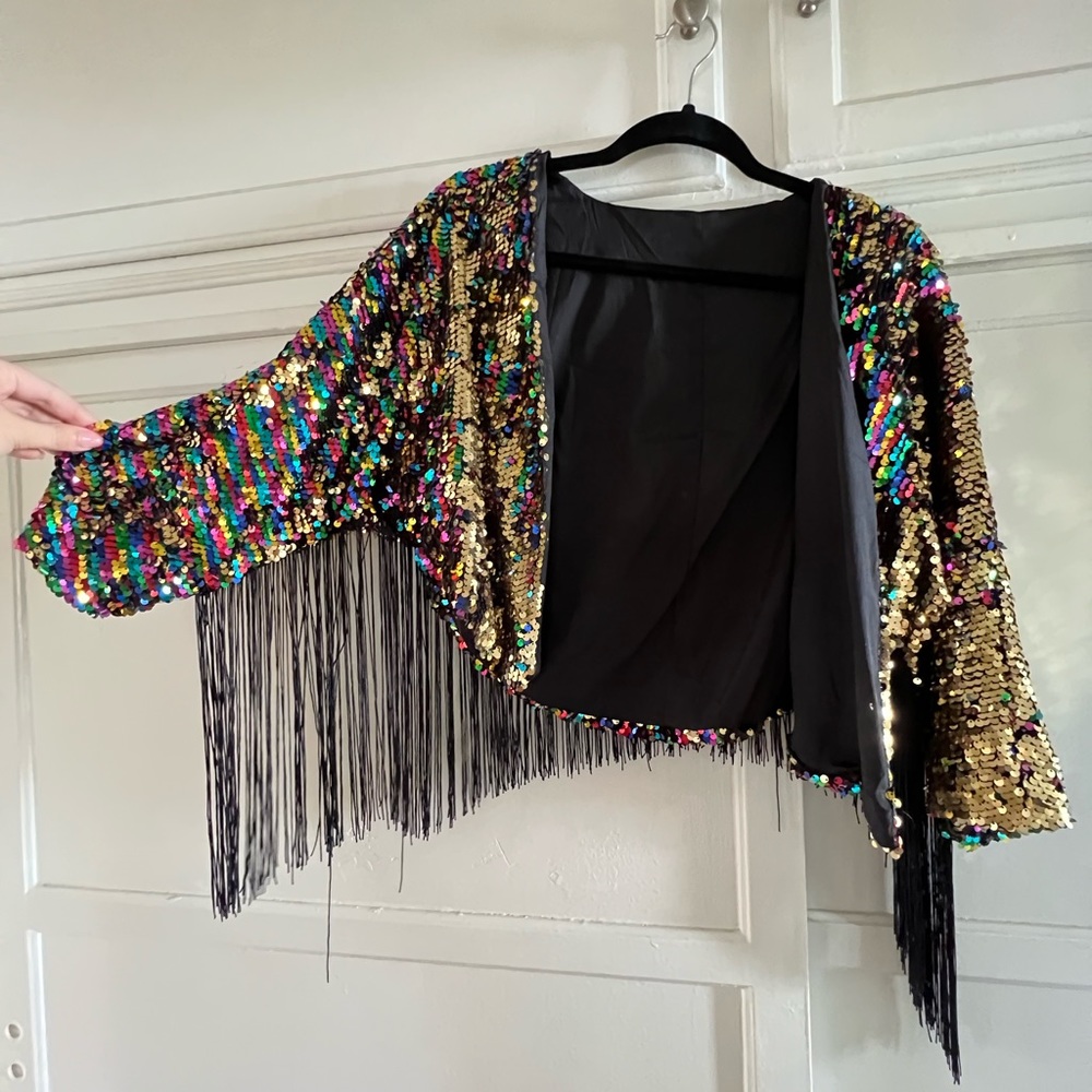 Calling all glitter girls! Sequenced fringed like jacket